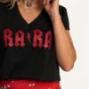 Camiseta Rara negra Aire Retro T-S/L Con Glitter